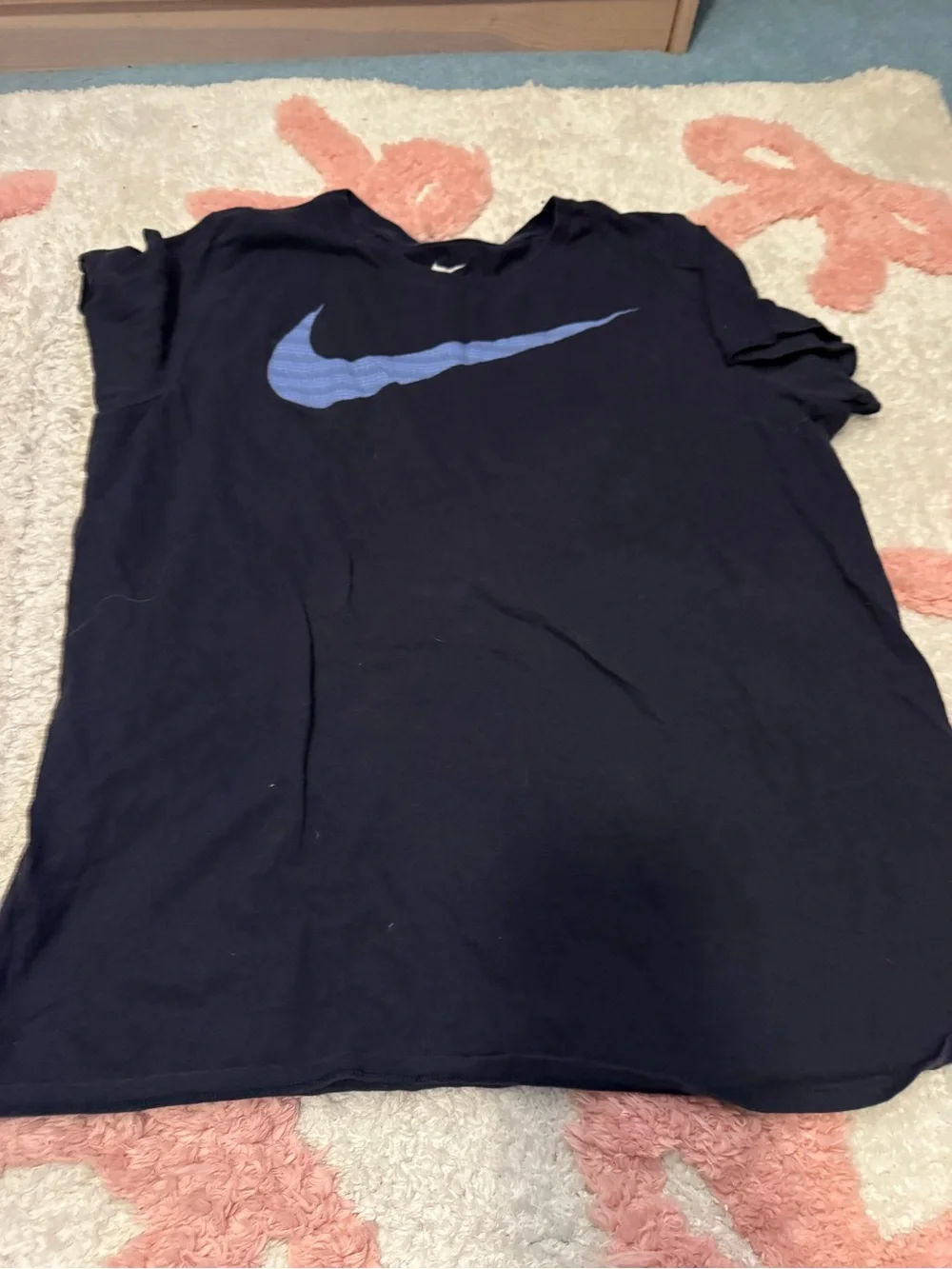 Nike Kids Black Short Sleeve Tee with Blue Swoosh